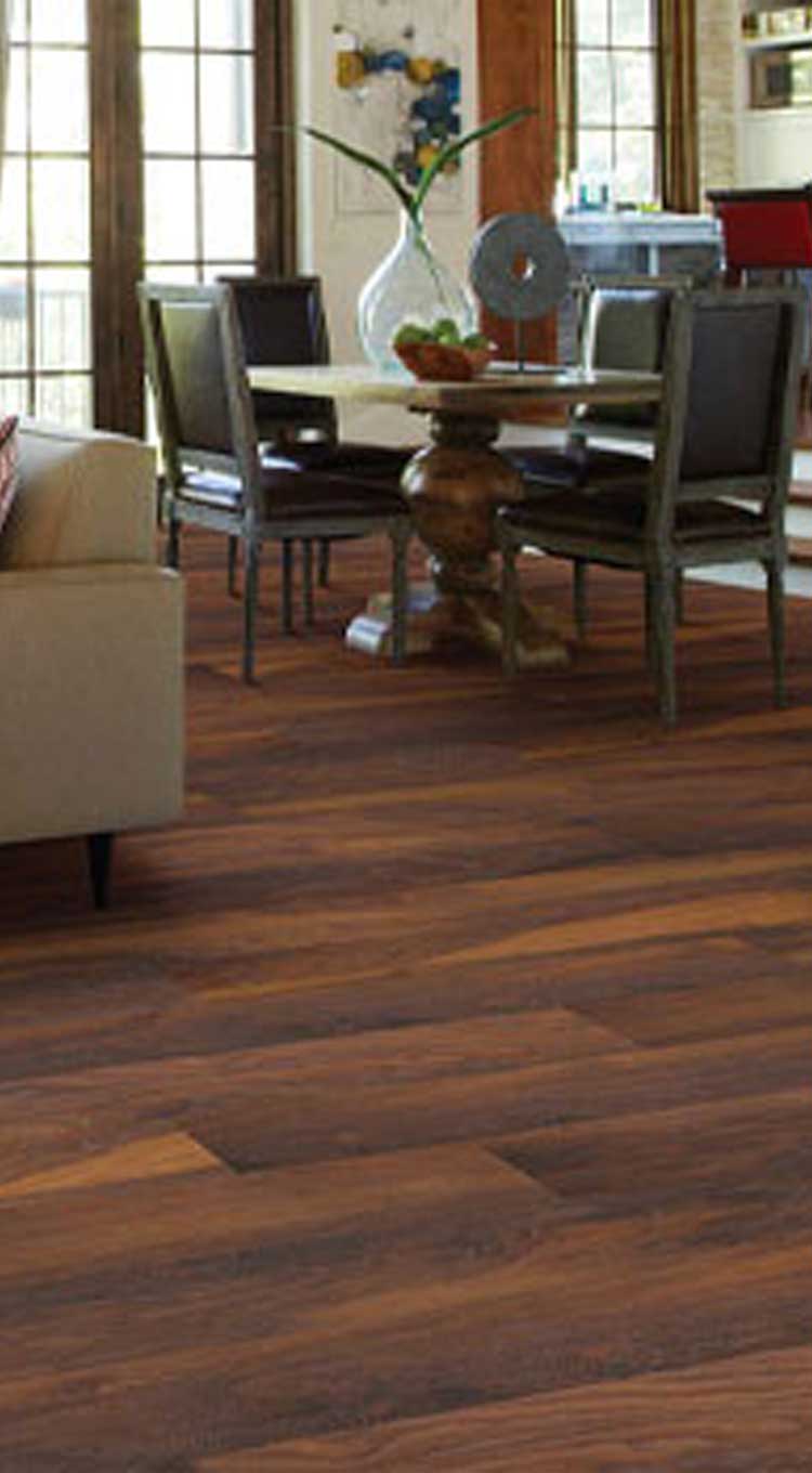 Hardwood flooring with tan couch living room